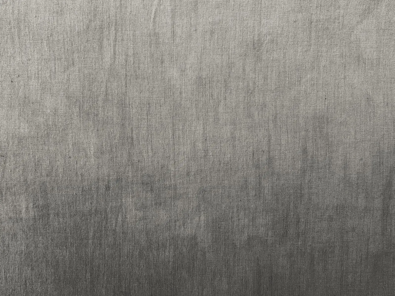 Matte brushed steel panel with fine vertical grain