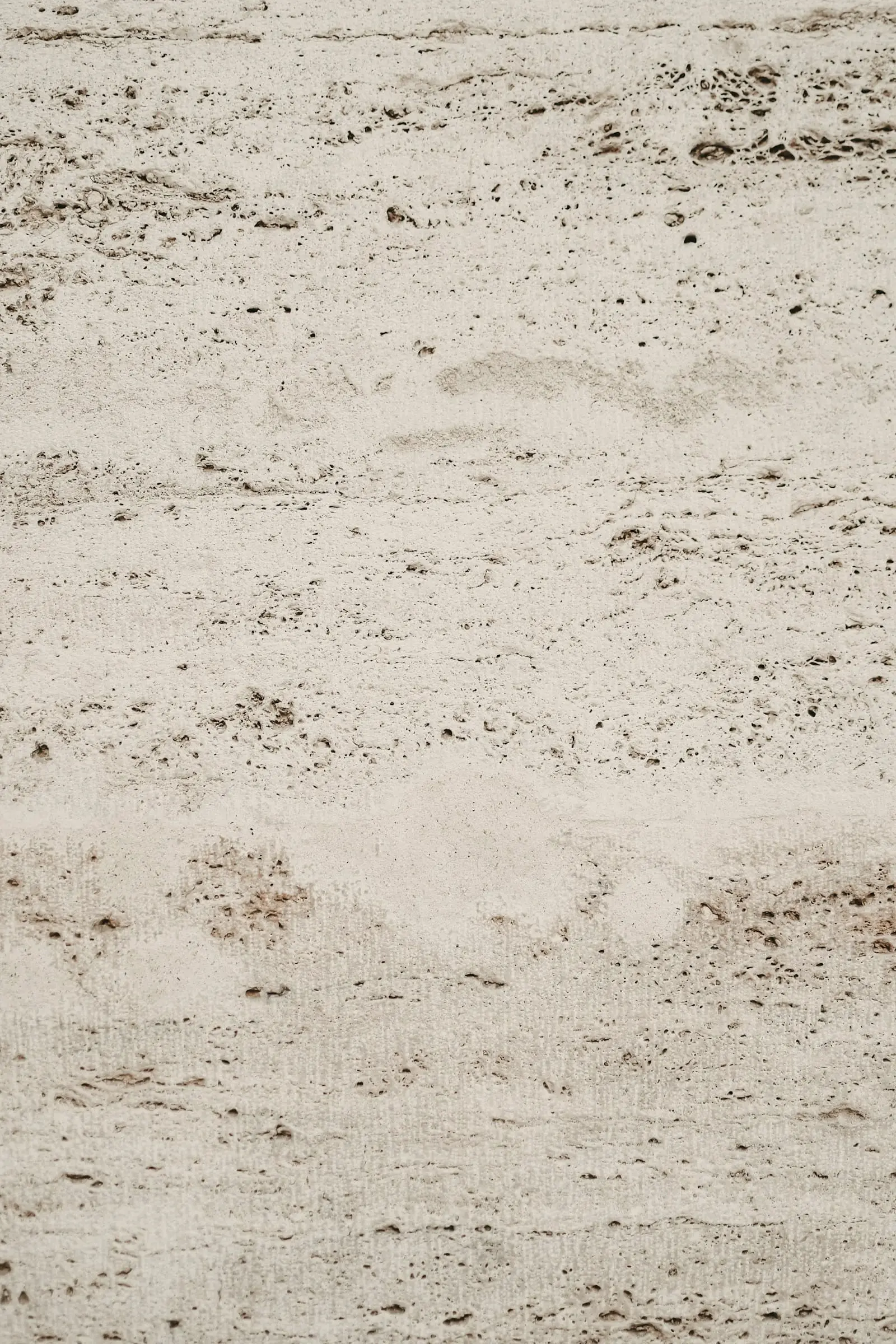 Close view of honed travertine with fine pores